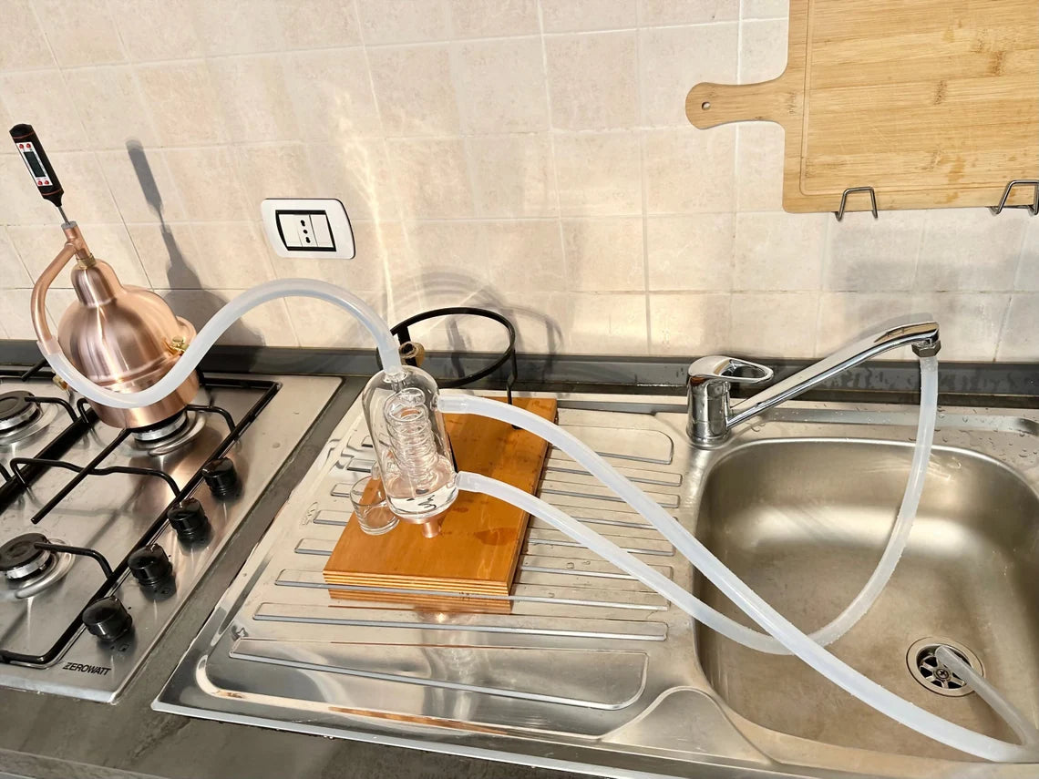 Alembic Distiller for essential oils & hydrolates in copper with glass condensation coil.