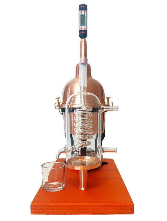 Alembic Distiller for essential oils & hydrolates in copper with glass condensation coil.